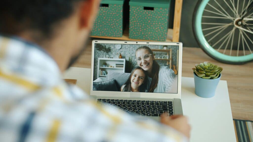 Parent Training. A therapist speaking with a family over video call