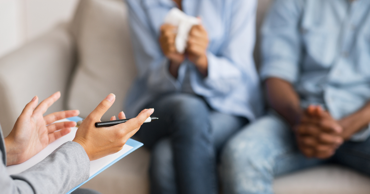 professional therapist making sure a patient's mental health is current